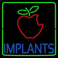 Implants With Apple Logo Neonreclame
